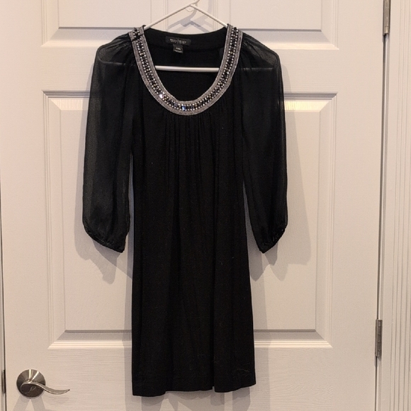 White House Black Market Dresses & Skirts - NWOT Elegant Black Dress with Embellished Neckline